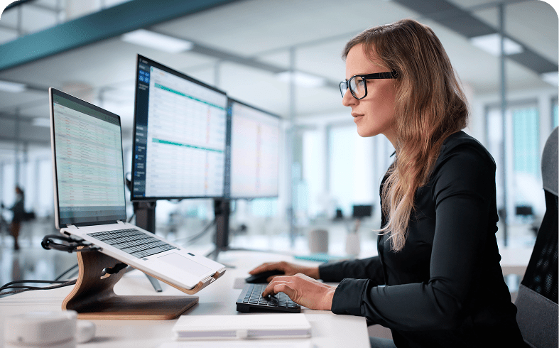 Office worker focused on computer tasks