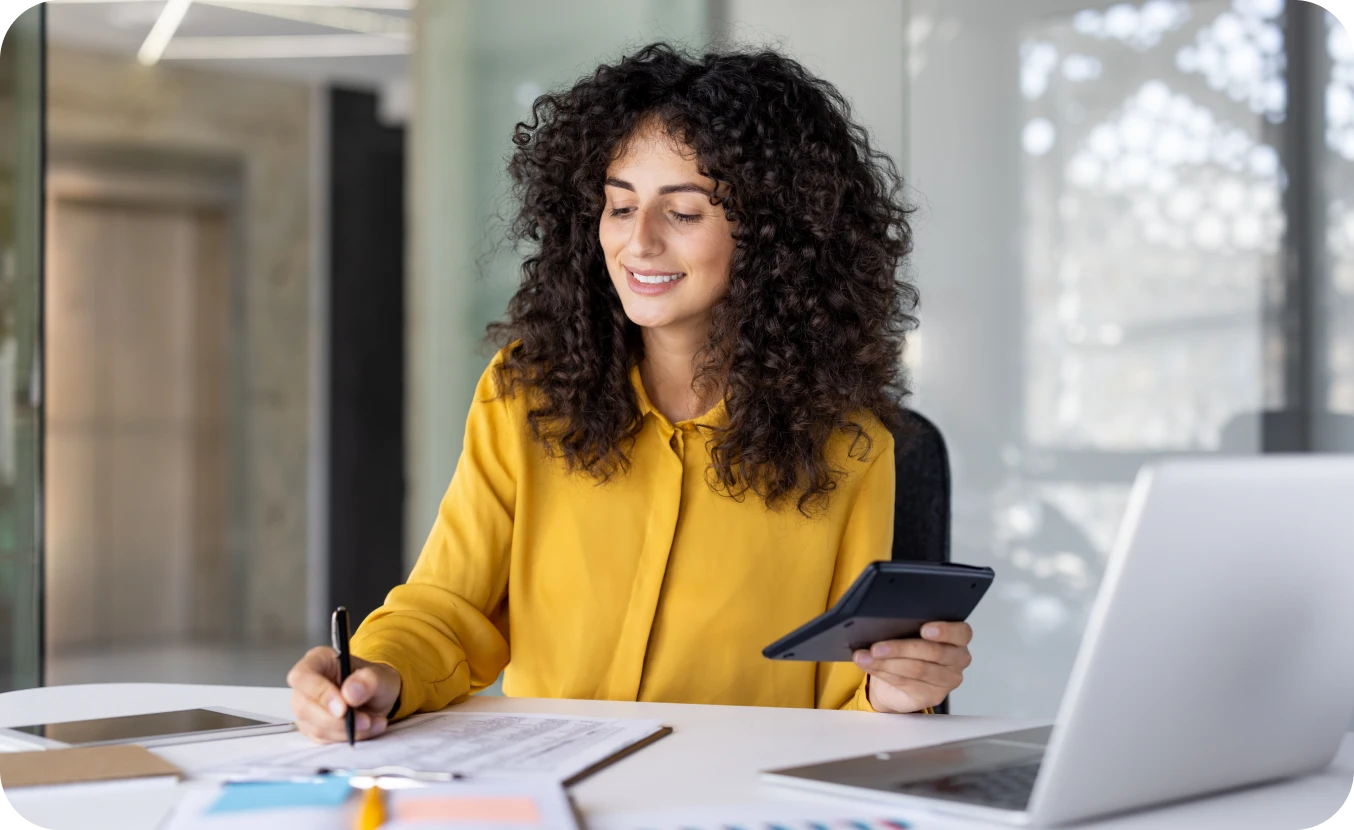 Woman working with documents and tablet