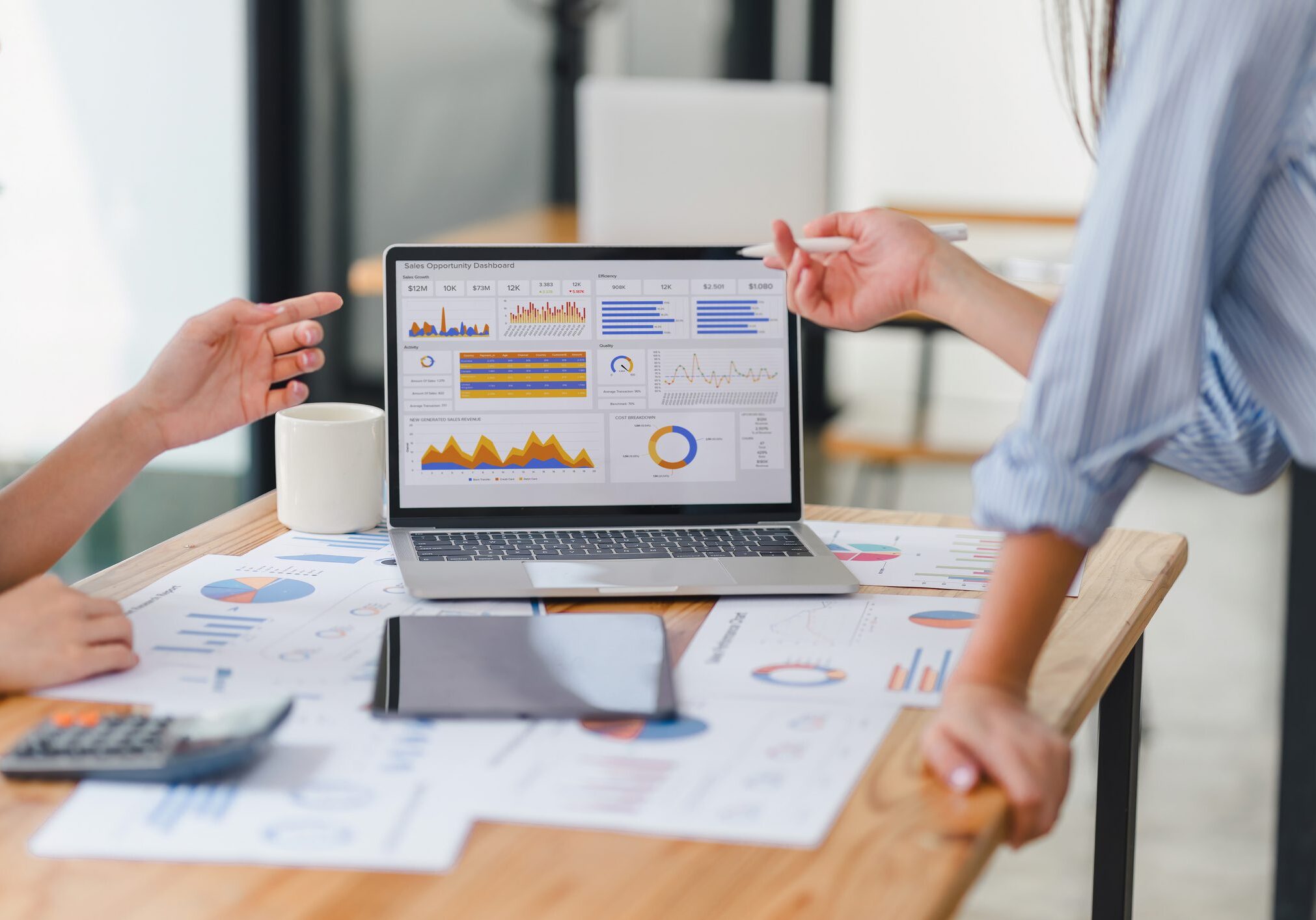 Two data analysts Working on data analysis dashboard for business strategy